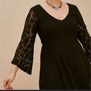 Black lace bell sleeve fluted mini dress